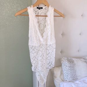 White lace bodysuit. Size M